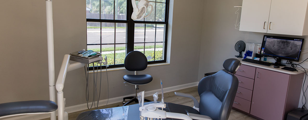 Dental chair and equipment inside a Hendricks Dental Studio treatment room
